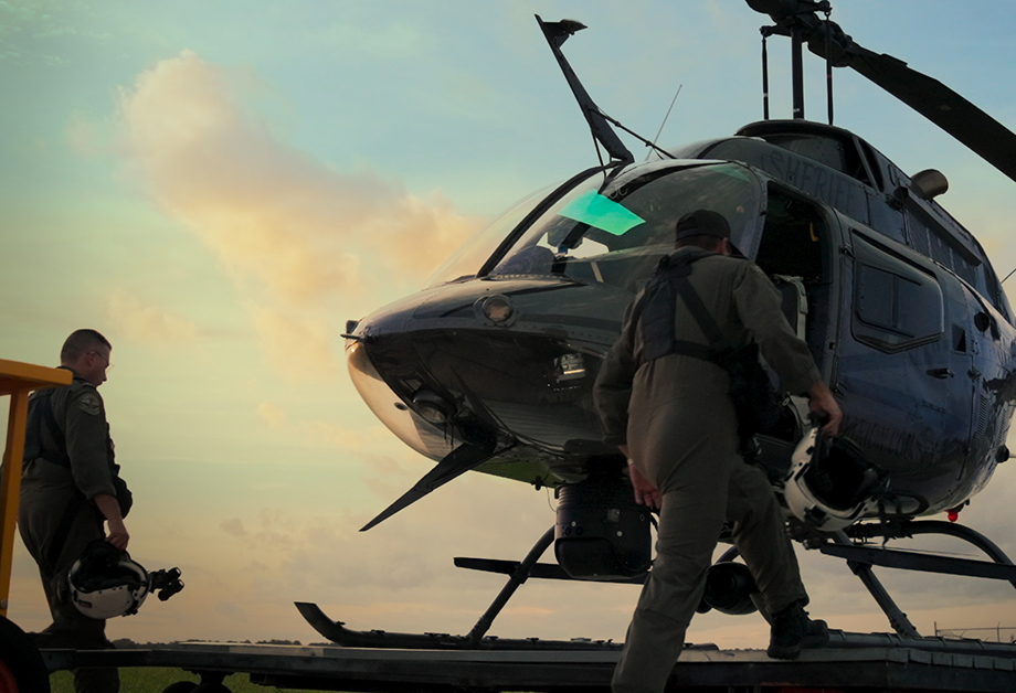 Air-1 aviation pilots board their chopper after receiving an call in Chopper Cops, episode 10, season 1, streaming on Paramount+, 2024. Photo Credit: CBS/Paramount+.